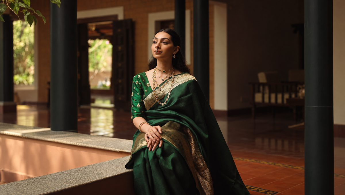 Arnav Maahi jewellery worn with a green sari